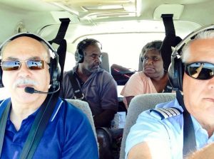 In flight to Elcho Island Chuck Grimes & Randall Pearson (front) and translators Djawut (left rear) & Yurranydjil