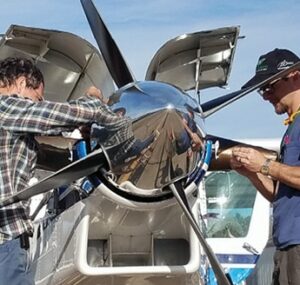 Putting_some_finishing_touches_on_the_Pilatus_Porter,_or_PC-6